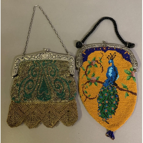 272 - A large c 1900 beaded bag with a design to both panels of a peacock seated on a branch with blossoms... 