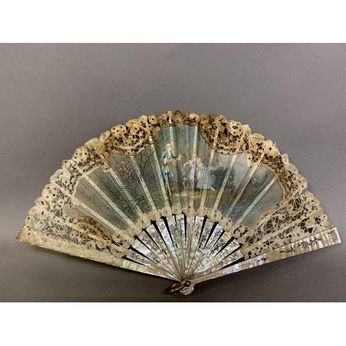 84 - An early 20th century Brussels tape lace fan with central painted gauze depiction of a courting coup... 