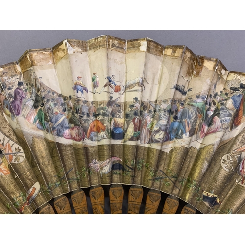 58 - A good, large  c 1890’s bone fan, mounted with a deep silk leaf, painted with an informal gathering ... 