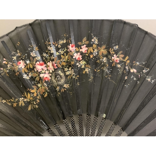 59 - c.1890’s, a large pink mother of pearl fan, the leaf of black lace mounted à l’anglaise, shaped head... 