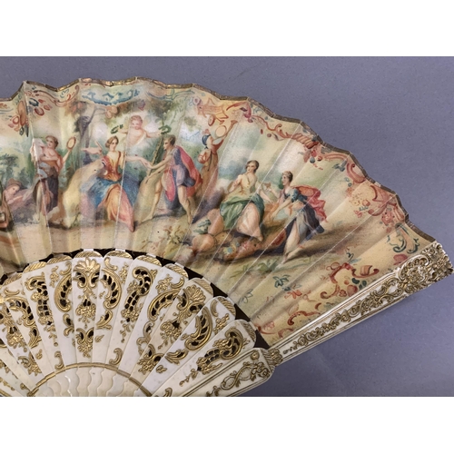 64 - A small bone late 19th century/early 20th century gilded bone fan mounted with the known printed sil... 