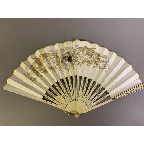 65 - A mid-19th century bone fan, the monture lightly carved and pierced, the lithographed leaf showing a... 