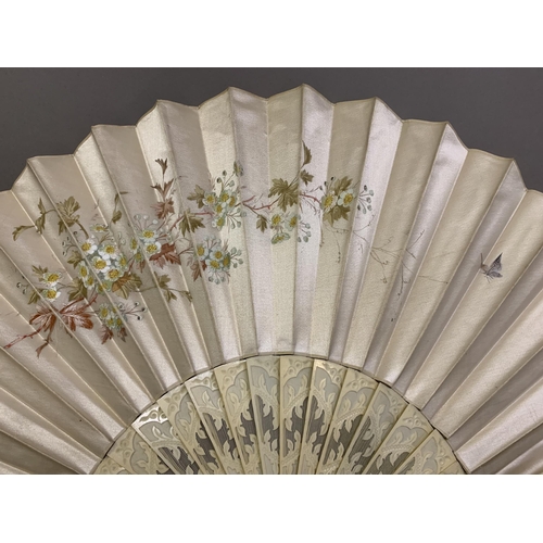 66 - Three bone fans c.1860- 1880’s, the first mounted with a cream silk leaf, painted with leaves, the f... 