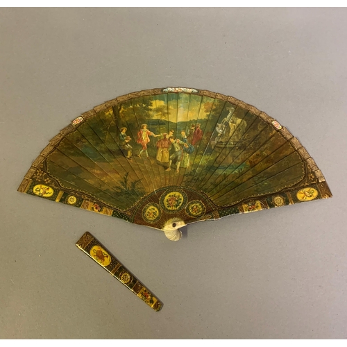 67 - A good 19th century Vernis Martin type brisé fan, bone sticks, almost totally decorated with a merry... 