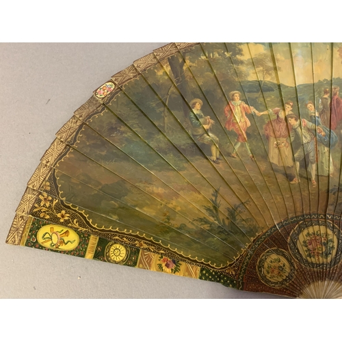 67 - A good 19th century Vernis Martin type brisé fan, bone sticks, almost totally decorated with a merry... 