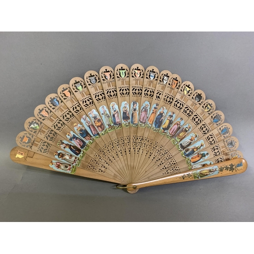 19 - 19th century light wood brisé fan with a transfer print of a winter scene showing impressive buildin... 