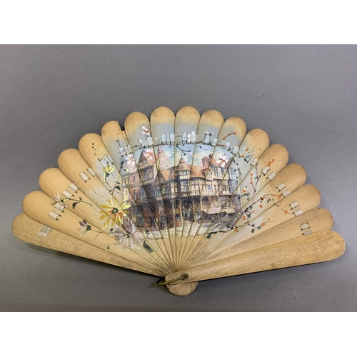 19 - 19th century light wood brisé fan with a transfer print of a winter scene showing impressive buildin... 