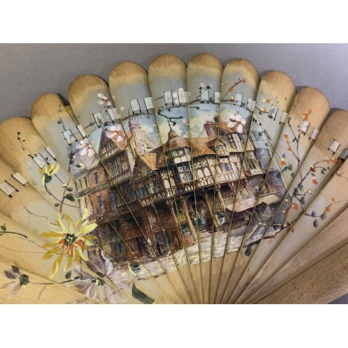 19 - 19th century light wood brisé fan with a transfer print of a winter scene showing impressive buildin... 