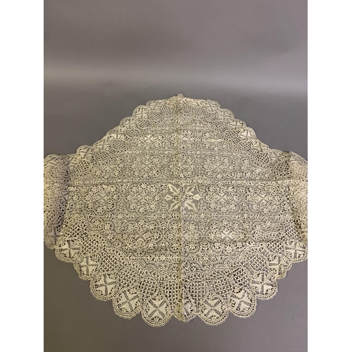 188 - A large, deep, silk Maltese lace shawl collar, with long ties, having a central Maltese cross plus n... 