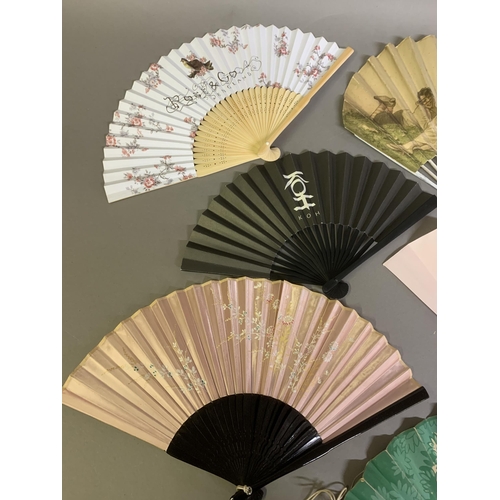 129 - Hotels and Fashion: ten advertising fans from the 1920’s and later, the first, in ballon form, signe... 