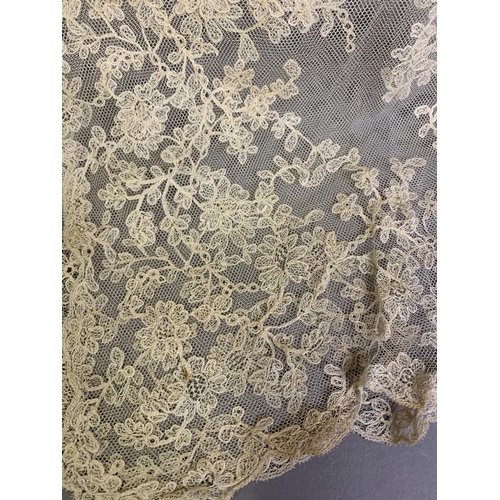 195 - Antique Lace: A rectangular embroidered net wedding veil, worked with a light and airy spriggy desig... 