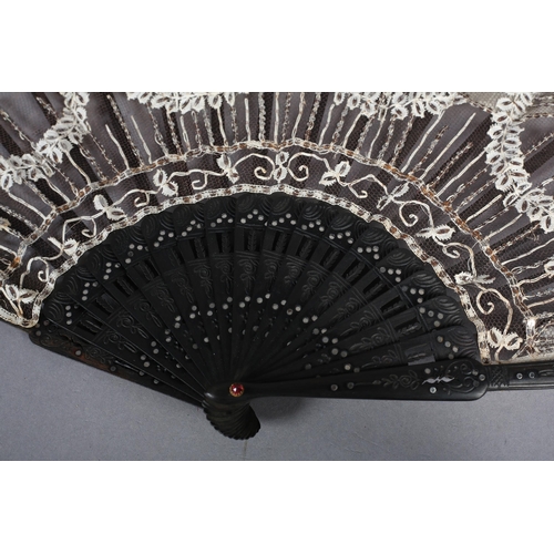 76 - Lace and sequin fan c 1905, the white lace handmade and most likely Belgian, applied onto black net,... 