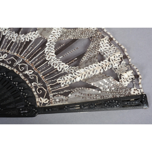 76 - Lace and sequin fan c 1905, the white lace handmade and most likely Belgian, applied onto black net,... 