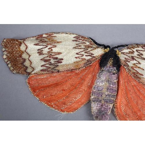 90 - Ann Collier: A large Humming bird moth fixed fan in bobbin lace, worked in a variety of threads, the... 