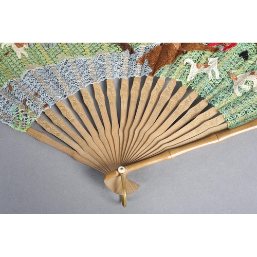 89 - Ann Collier: The Hunt, a large bobbin and needle lace fan mounted on pale wood, the guards, in bambo... 