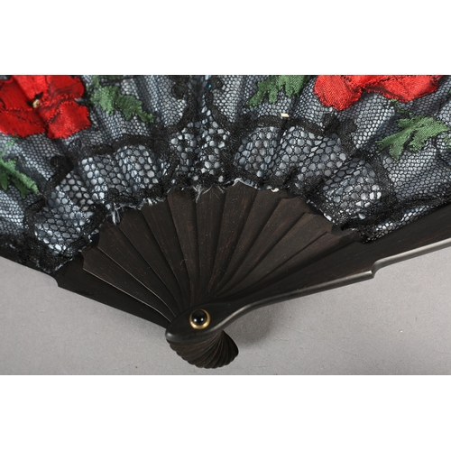 91 - Ann Collier: a small black wood fan with mother of pearl decoration applied to the upper guard, the ... 