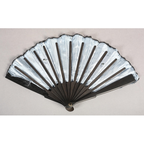 91 - Ann Collier: a small black wood fan with mother of pearl decoration applied to the upper guard, the ... 