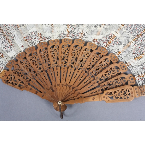 94 - Ann Collier: A cream bobbin lace leaf featuring two stylized dragons facing the flaming pearl, the l... 