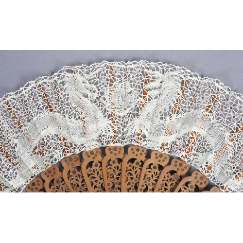 94 - Ann Collier: A cream bobbin lace leaf featuring two stylized dragons facing the flaming pearl, the l... 