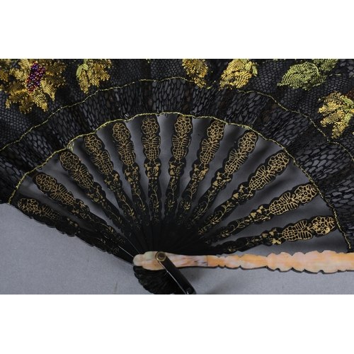 96 - Ann Collier: The Sunflowers, a bobbin lace leaf with black ground edged in gold, complementing the g... 