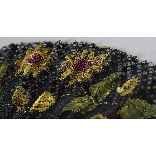 96 - Ann Collier: The Sunflowers, a bobbin lace leaf with black ground edged in gold, complementing the g... 