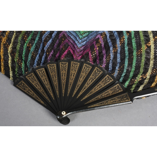 100 - Ann Collier: The rainbow, a bobbin lace fan in bold colours, the design quite complex with several f... 