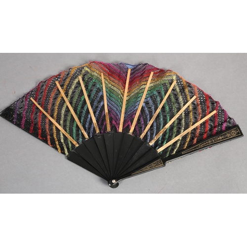 100 - Ann Collier: The rainbow, a bobbin lace fan in bold colours, the design quite complex with several f... 