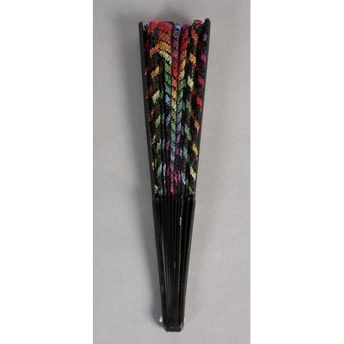 100 - Ann Collier: The rainbow, a bobbin lace fan in bold colours, the design quite complex with several f... 