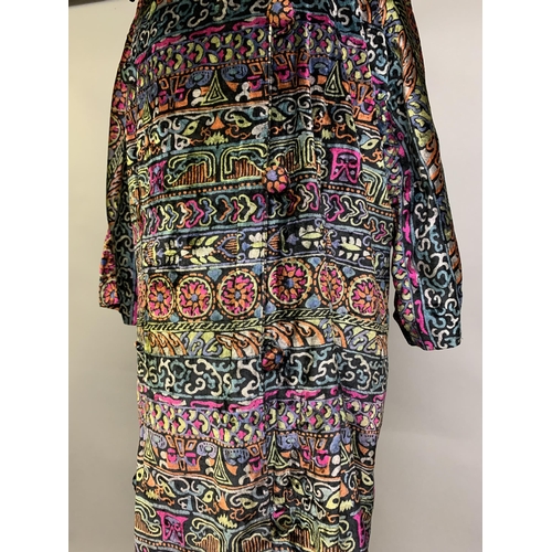 269 - Liberty: A 1920’s/1930’s polychrome soft velvet coat, the sleeves to the elbow, the design a mix of ... 