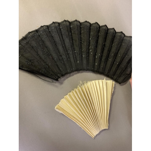 72 - A large selection of 19th century lace fan leaves, plus a small lace parasol cover (A/F) and a leaf ... 