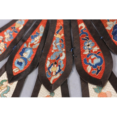 338 - Chinese embroidery, Qing Dynasty: A tiny pair of lotus shoes for bound feet, the lower section in tu... 