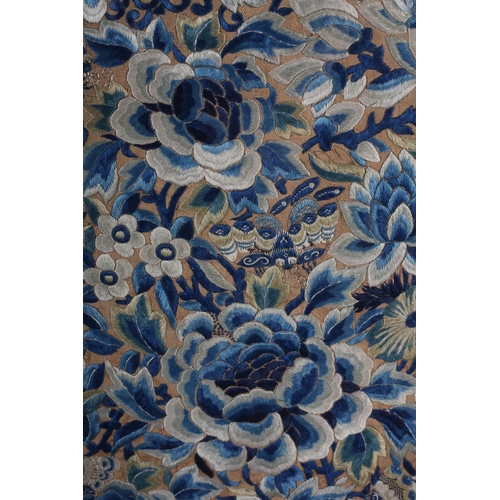 328 - A Chinese silk embroidered panel, Qing Dynasty, from the front of a skirt, floral embroidery in shad... 