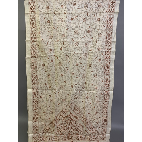 302 - A cream silk shawl embroidered in ginger, probably upper Bengal, the deep end panels with a bold tri... 