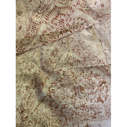 302 - A cream silk shawl embroidered in ginger, probably upper Bengal, the deep end panels with a bold tri... 