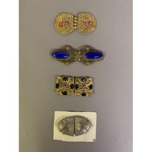 267 - Art Deco and later decorative belt buckles with four in silver metal and seven in gold metal: consis... 