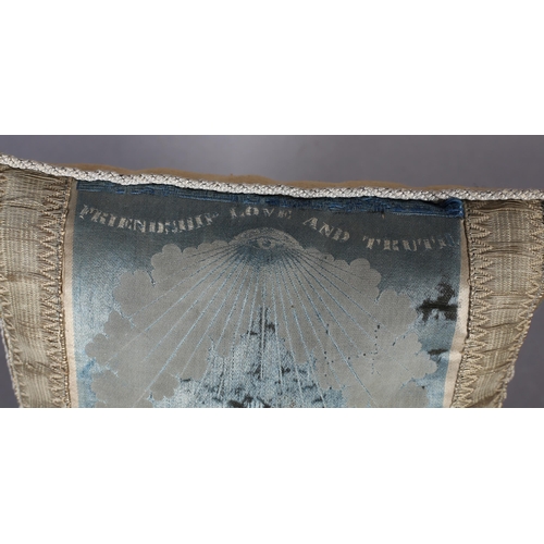 210 - A 19th century woven silk cushion, small, pale turquoise and gold,  bearing the symbols and blazon o... 