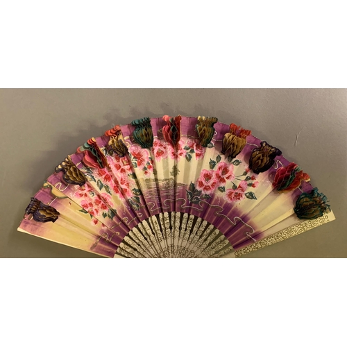 106 - A 19th century small marquetry game bird feather fan, layered from speckled to cream to bi-colour br... 