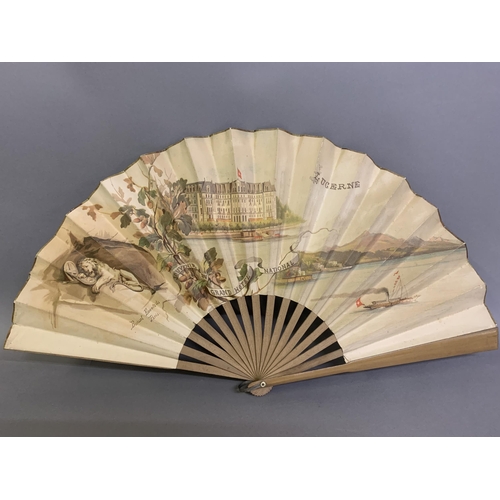 119 - A large late 19th century wood fan by Buissot Eventails Paris, the double paper leaf printed to the ... 