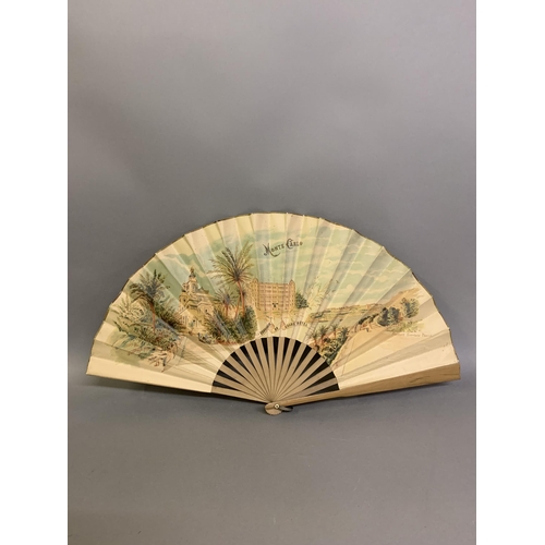 119 - A large late 19th century wood fan by Buissot Eventails Paris, the double paper leaf printed to the ... 