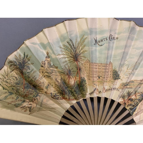 119 - A large late 19th century wood fan by Buissot Eventails Paris, the double paper leaf printed to the ... 