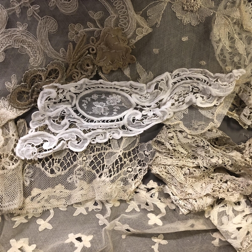 197 - A quantity of mainly Edwardian lace and costume flounces trimmings, in Maltese lace, Beds Maltese ta... 