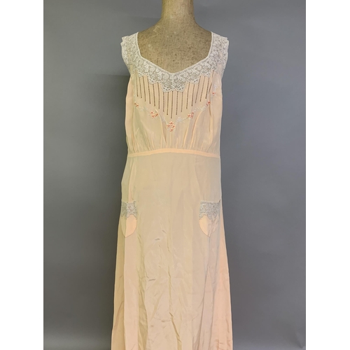 287 - Fine quality deep apricot silk lingerie, 1930’s/40’s: a knee-length petticoat with shoe-string strap... 