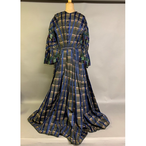 217 - A tartan silk dress c 1850’s, long pagoda sleeves, gathered and shaped, lined in cream glazed cotton... 