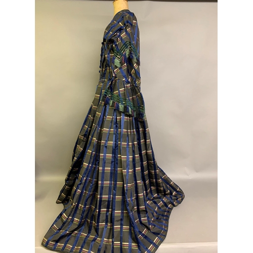 217 - A tartan silk dress c 1850’s, long pagoda sleeves, gathered and shaped, lined in cream glazed cotton... 