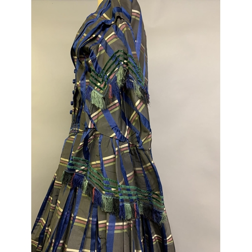 217 - A tartan silk dress c 1850’s, long pagoda sleeves, gathered and shaped, lined in cream glazed cotton... 