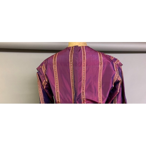 218 - A fine and unusual striped purple silk dress c 1850’s, with tiered pagoda sleeves, finished with sil... 