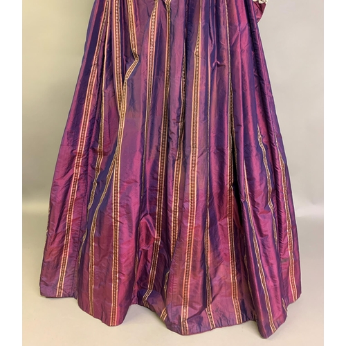 218 - A fine and unusual striped purple silk dress c 1850’s, with tiered pagoda sleeves, finished with sil... 