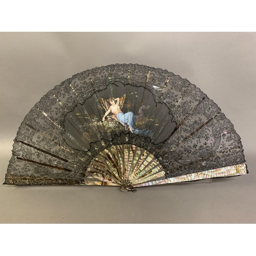 43B - Three 19th century fans, the first a c 1890’s large lace fan with painted gauze panel, the monture o... 