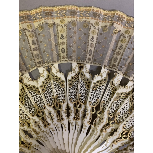 43B - Three 19th century fans, the first a c 1890’s large lace fan with painted gauze panel, the monture o... 