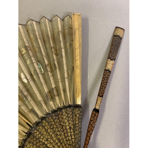 140 - Four Chinese folding fans, 18th/19th century, Qing Dynasty, the first with wood sticks painted red, ... 